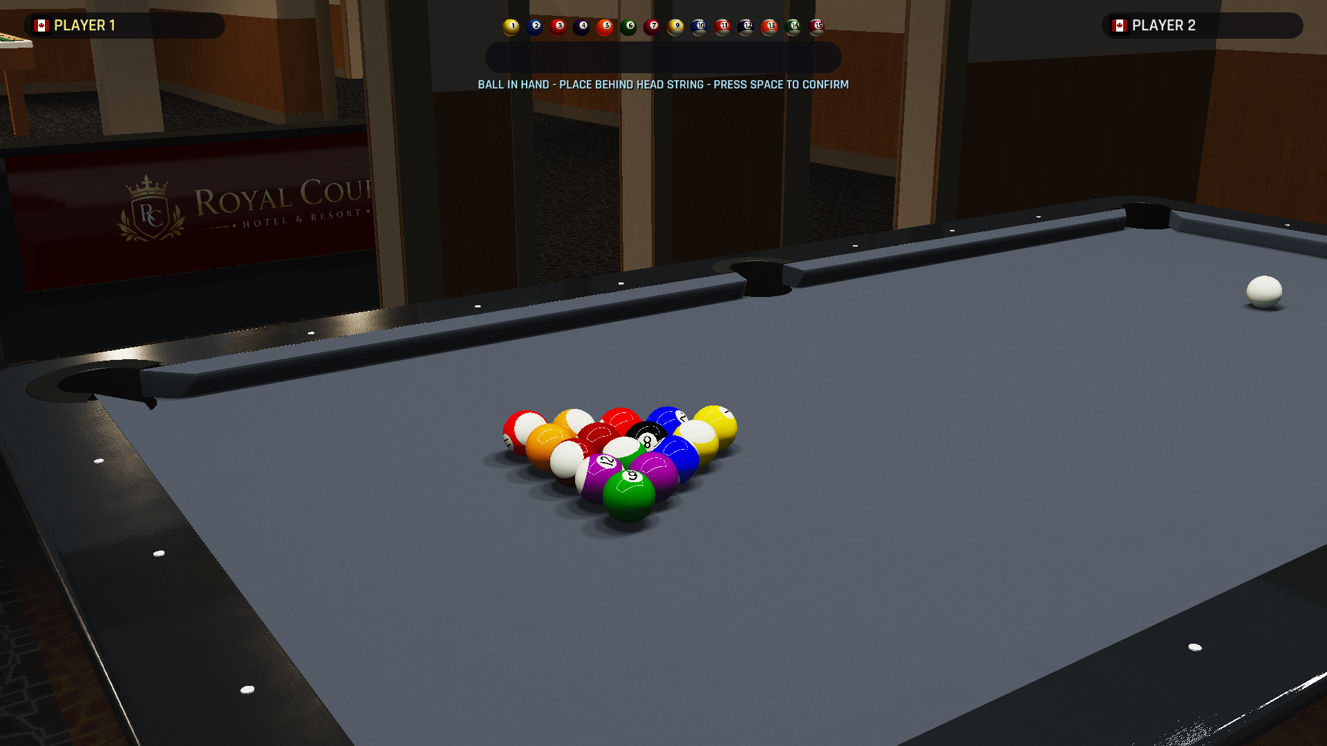 Cue Circuit racked balls on a brushed aluminum table
